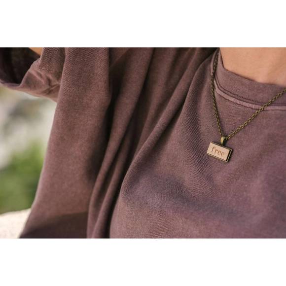 NEW STATEMENT PEACE women's live free drop necklace in natural - Picture 2 of 3
